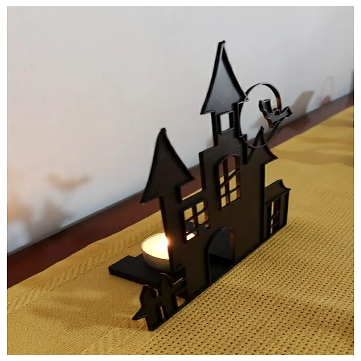 halloween haunted house decor spooky bats hanging from ceiling black candlestick holders for party table centerpiece