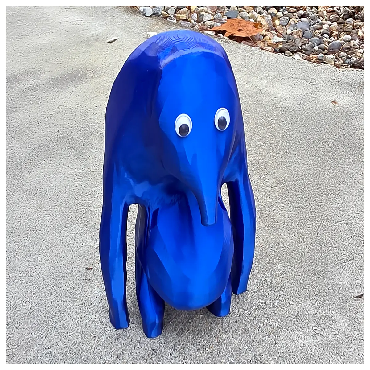 blue blob dude toy with movable eyes funny wobble head stress relief figure cute animated character collectible