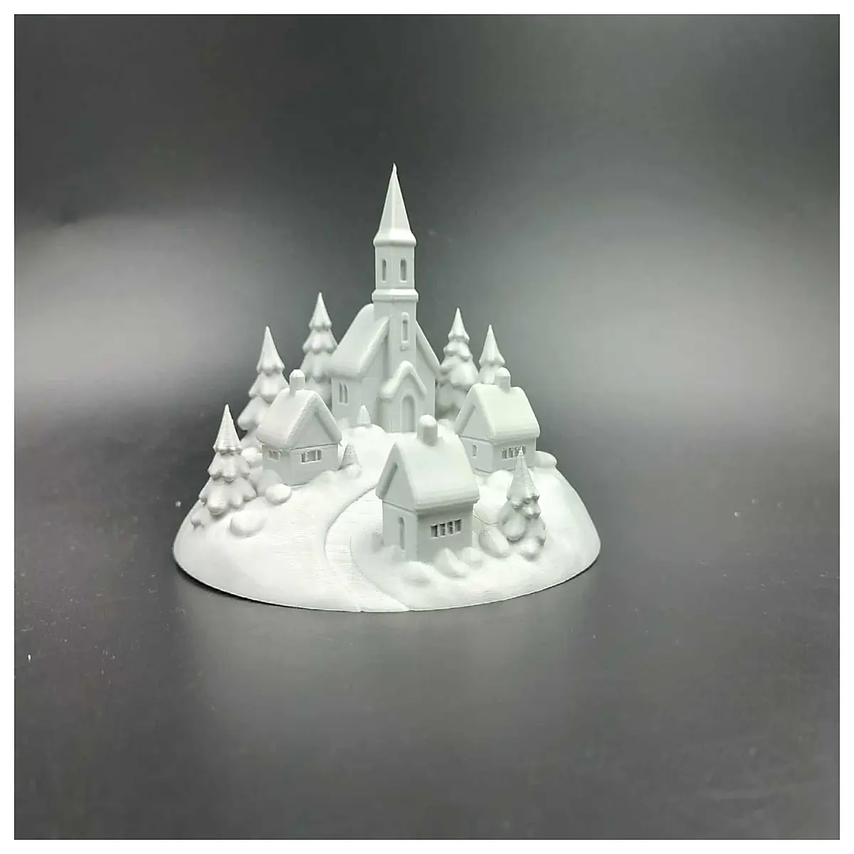 miniature winter village scene with snow christmas decoration for home festive holiday table centerpiece cozy snowy landscape