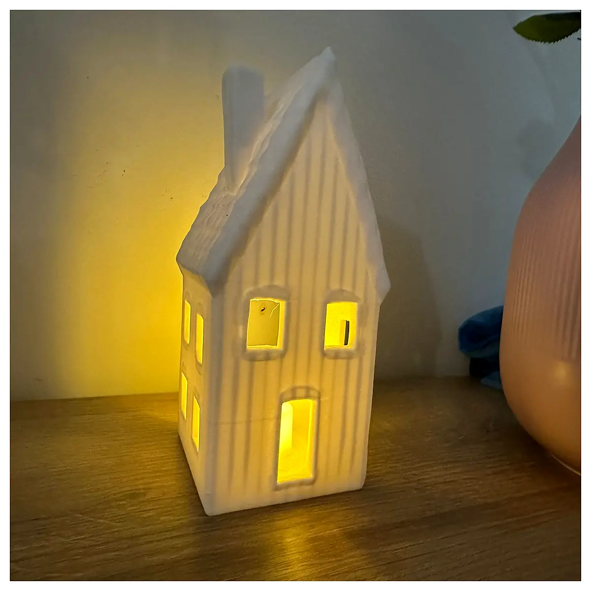 ceramic tea house holder with cutout patterns for candlelight ambiance