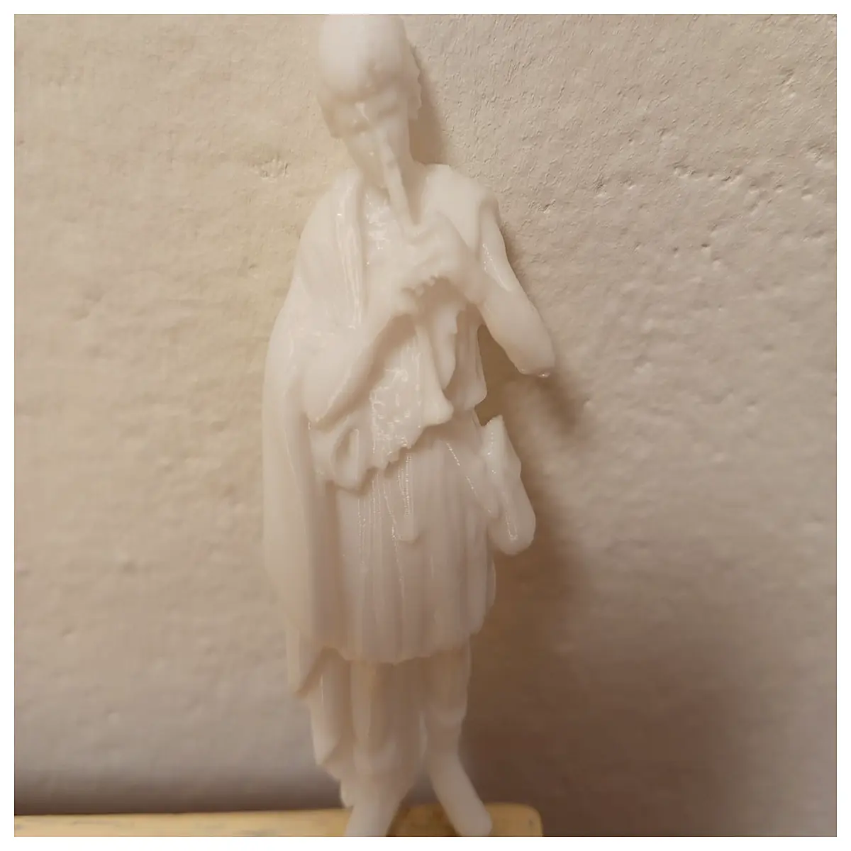 christmas village figurine boy playing flute holiday decoration