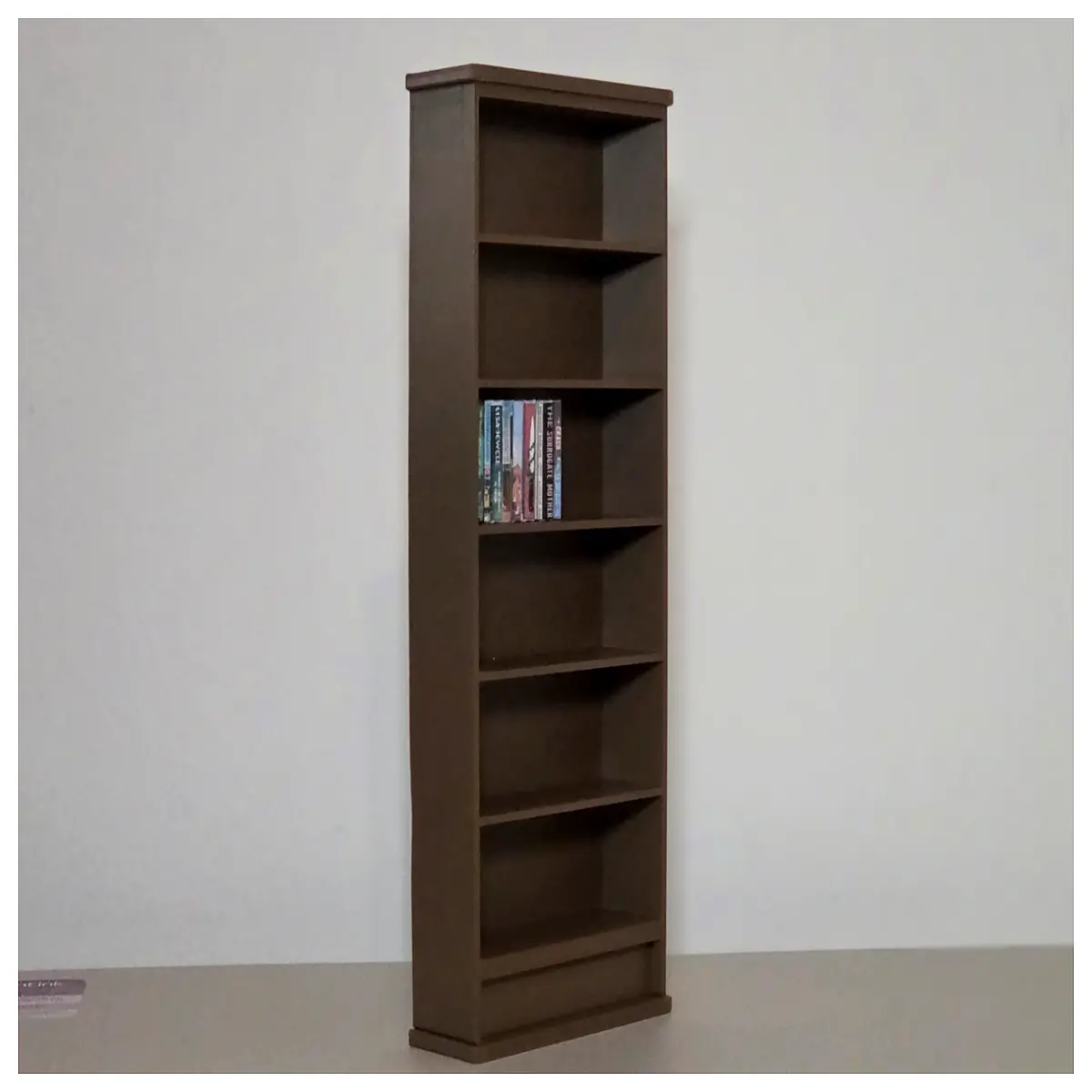 miniature dollhouse bookshelf with hidden compartment for tracking collectibles and small toys storage