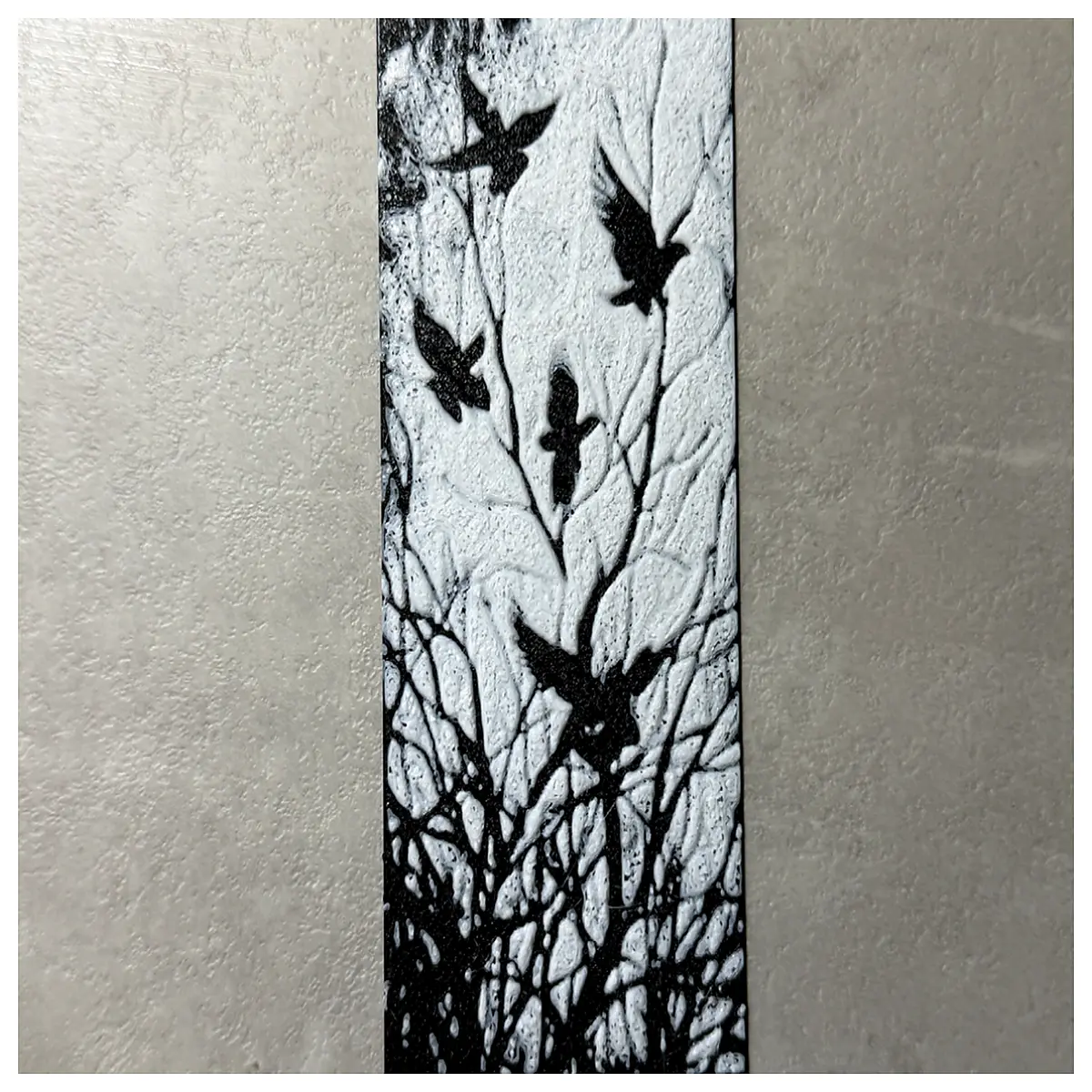 rustic wooden bookmark with crow flying over forest trees literary book lovers nature aesthetic reading accessory