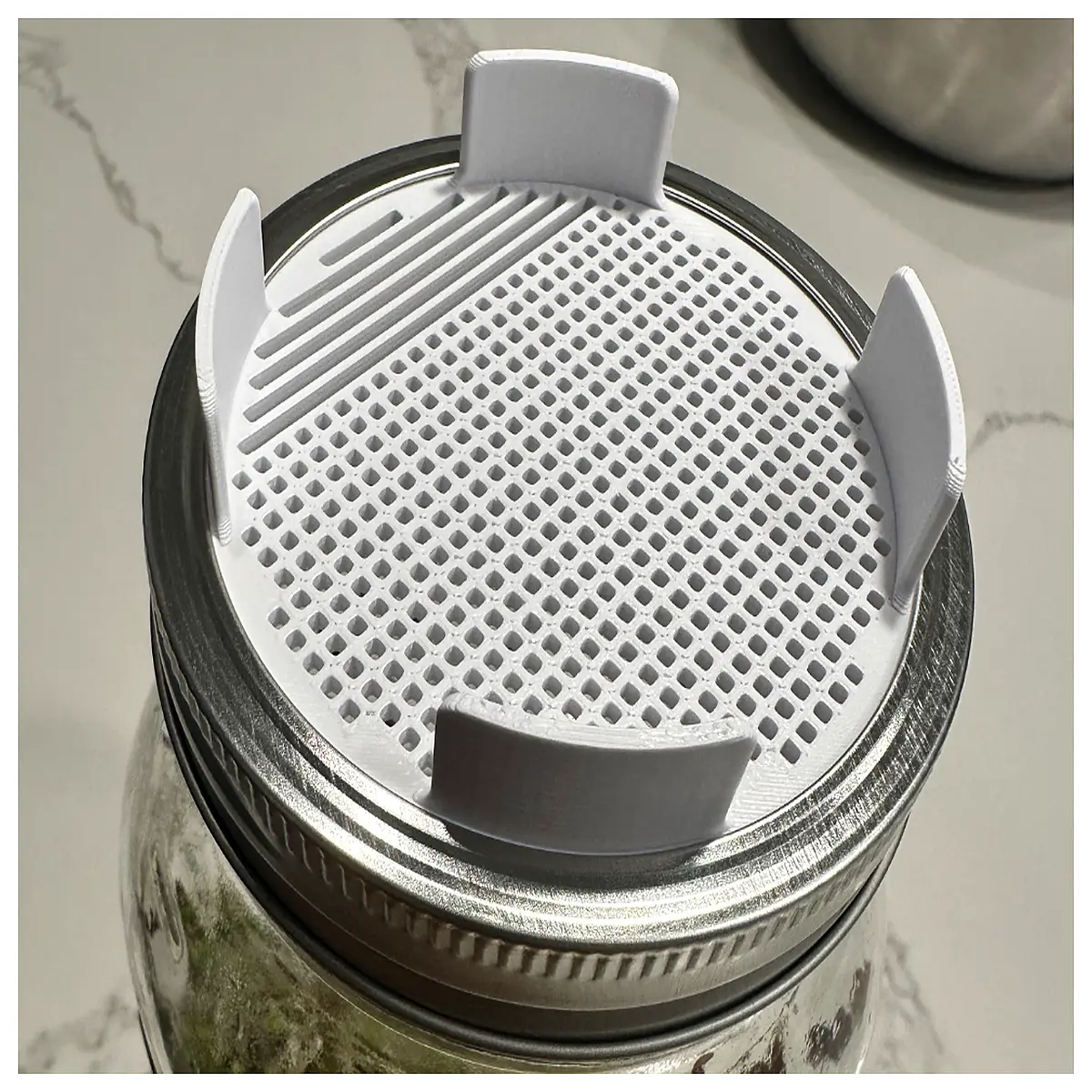 diy seed starting jar lid with drainage holes for hydroponic sprouts and microgreens growing