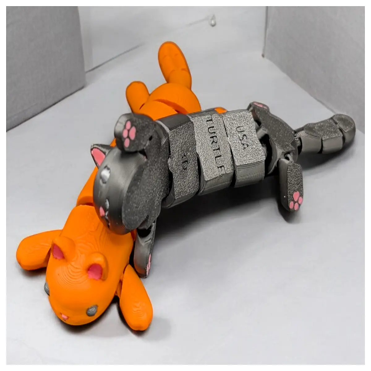 plush grey cat toy with movable limbs and realistic colors for interactive play