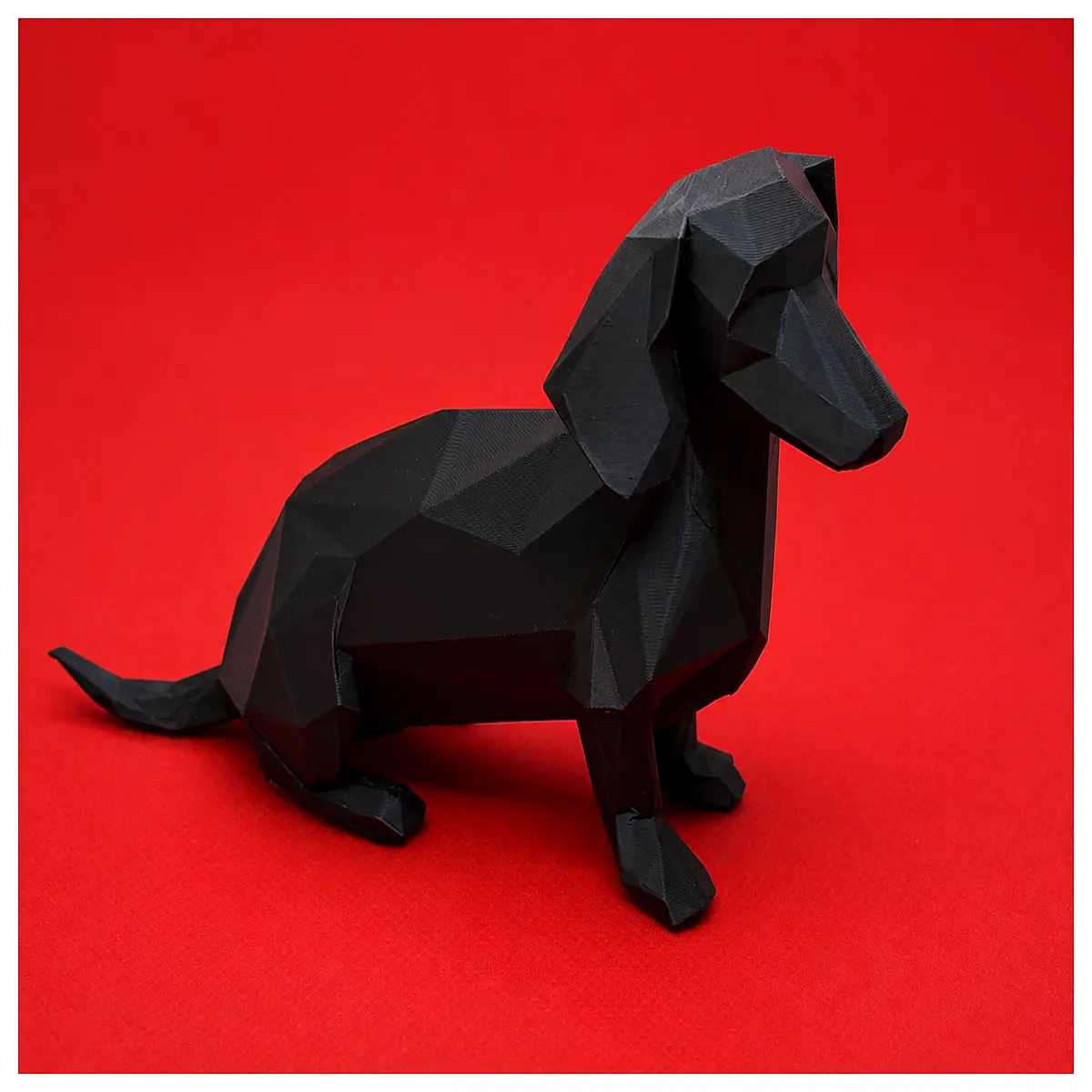 low poly dachshund sitting figurine polygonal dog statue for desk decor