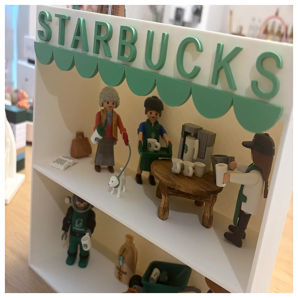 mini retail store merchandising shelf for cups and merchandise