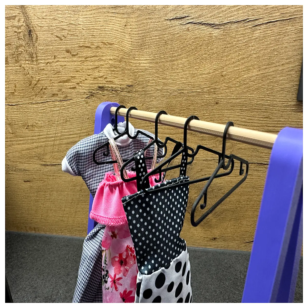 modern doll hanger no support needed for baby clothes storage