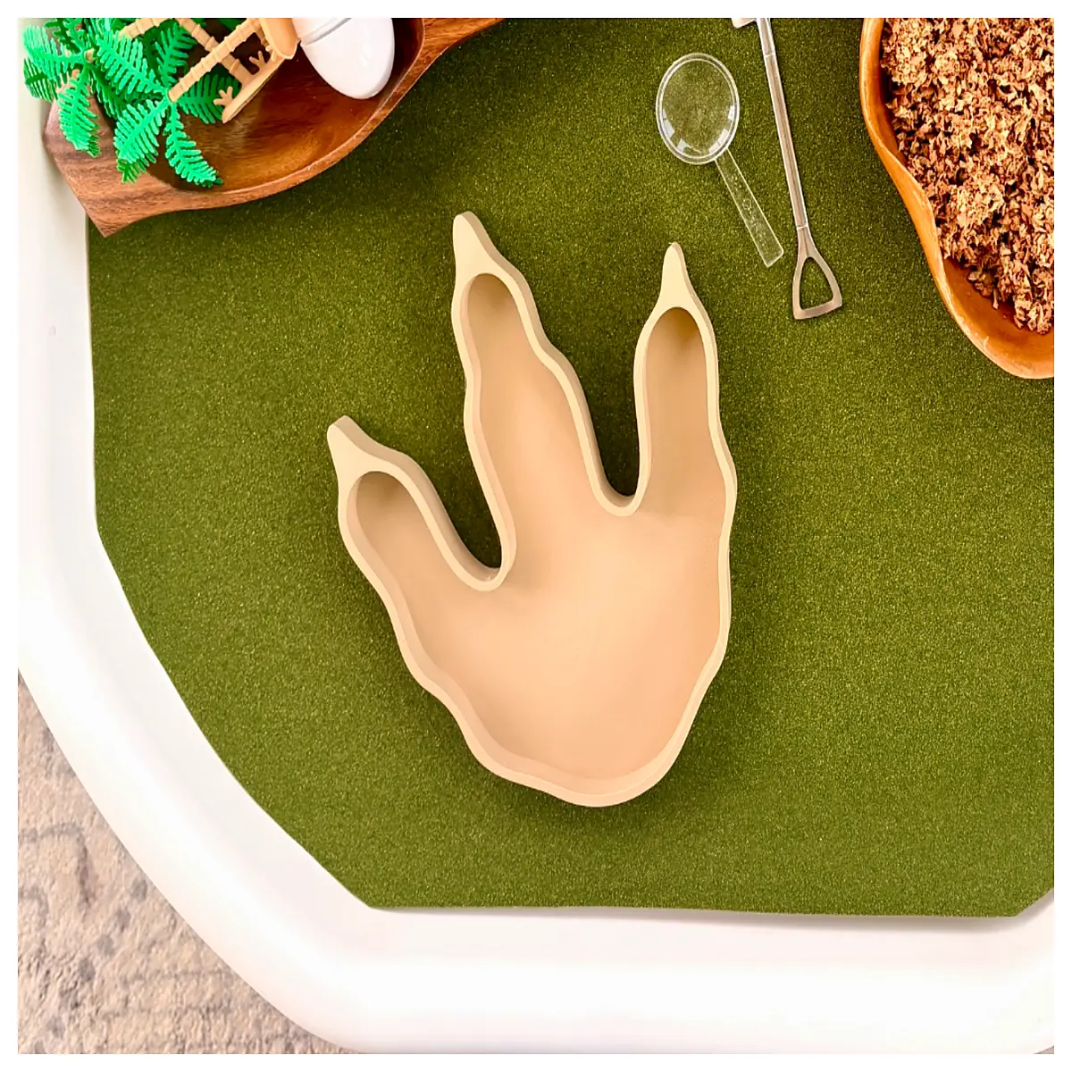 dinosaur footprints sensory bin play dough kids tummy time activity
