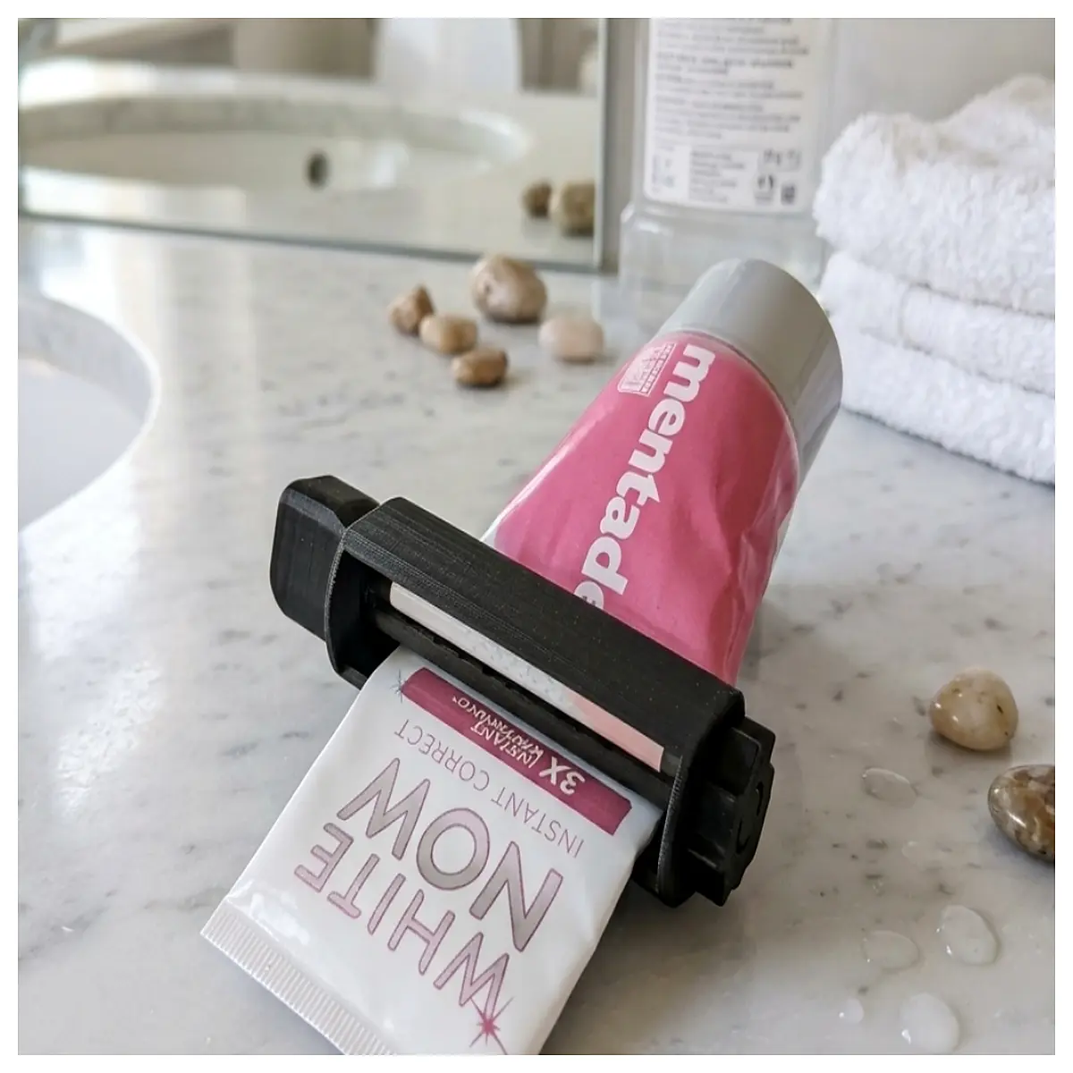 manual toothpaste squeezer roller tube expander for bathroom sink organization