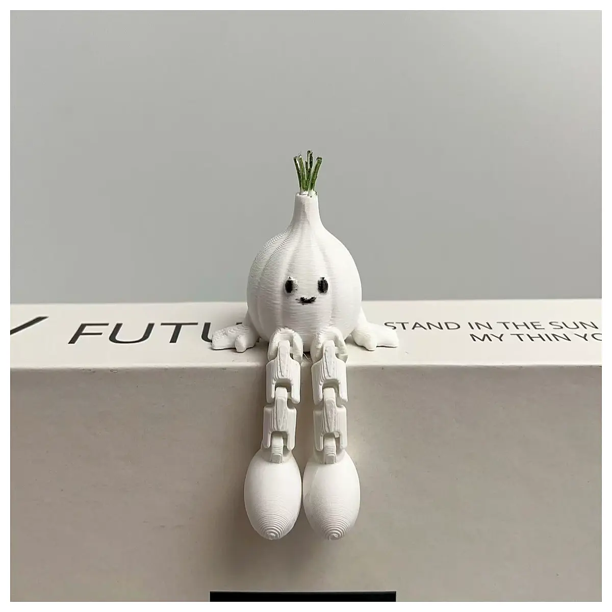 funny garlic desk toy with movable joints quirky computer accessory for office humor